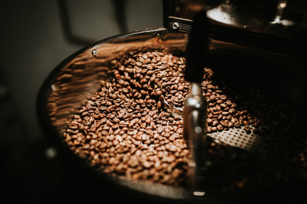 Coffee beans in an open top coffee roaster