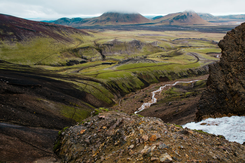 Landscape photo of Iceland with fjords and green scenery